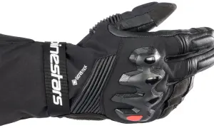 Svart motorcykelhandske med Gore-Tex, förstärkningar och logotyp. Perfekt för din handskars storleksguide.