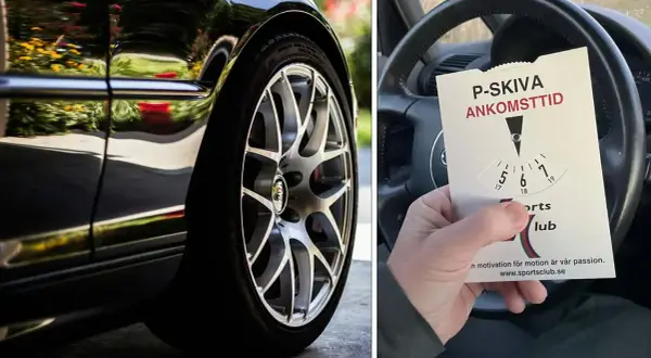 En hand håller en p-skiva med ankomsttid inställd, bredvid ett bilhjul.